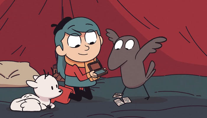 『ヒルダの冒険』で、カラスに署名させるヒルダ