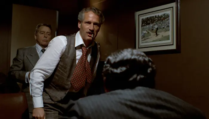 映画『スティング』で、列車でポーカーでロネガンを負かすヘンリー・ゴンドーフ